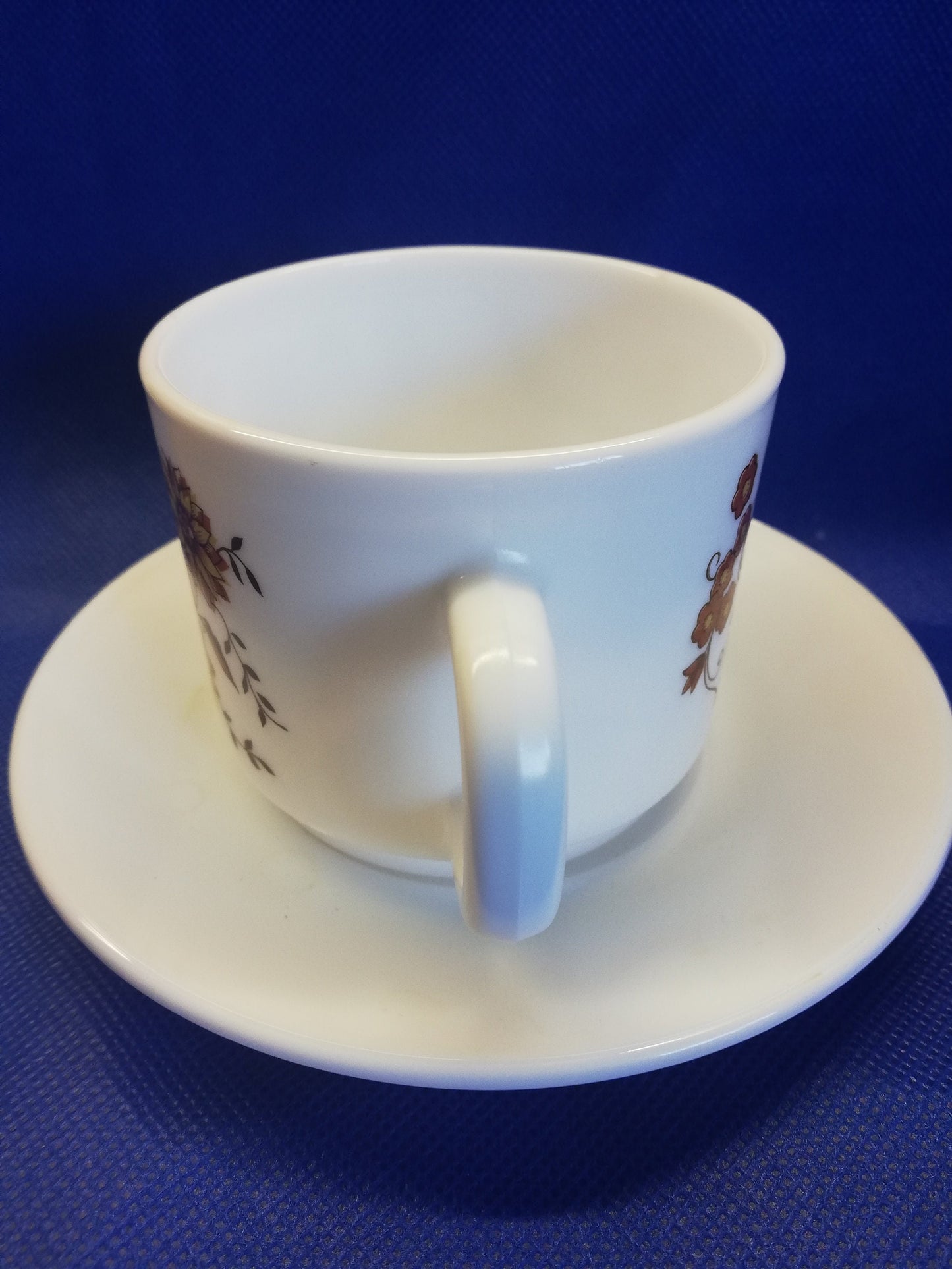 Arcopal milk white glass cup and saucer - French - brown onion decoration