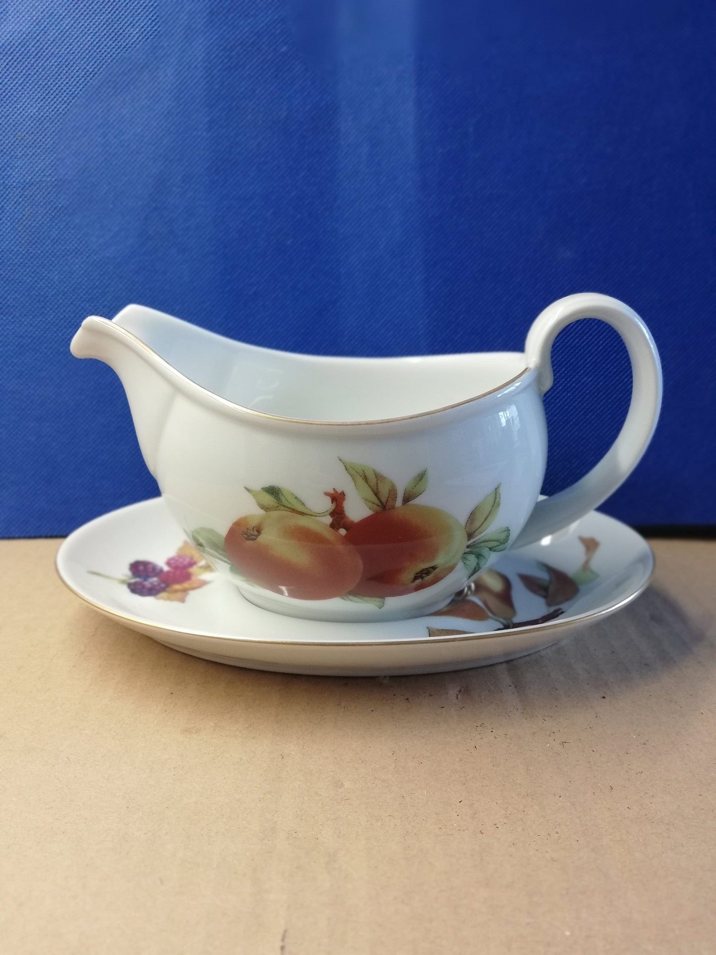 Royal Worcester Evesham gravy / sauce boat with saucer