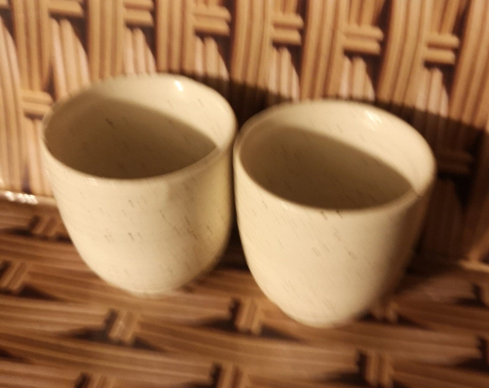 Pair of Churchill egg cups with in speckled cream ridged design