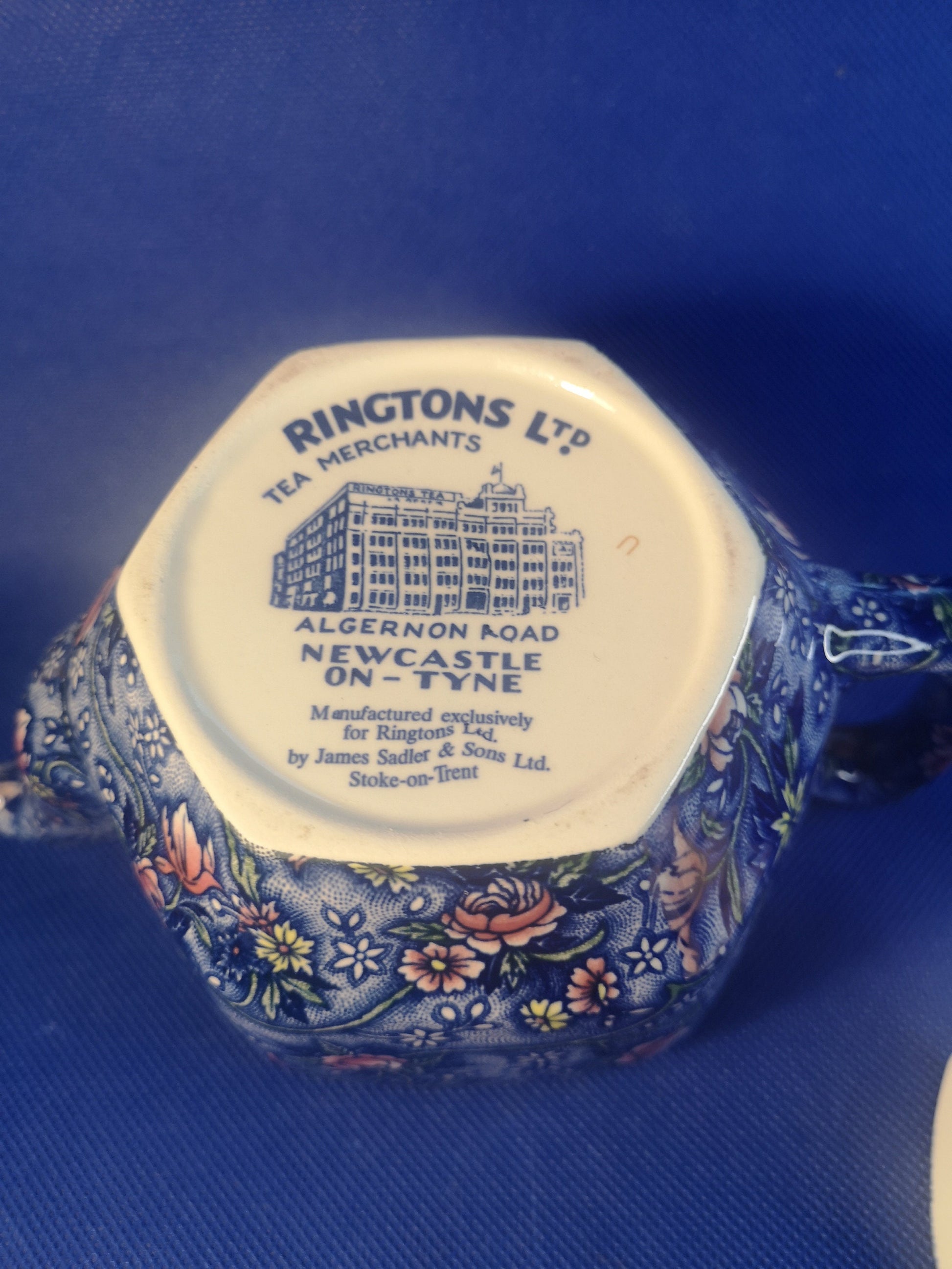 Ringtons teapot by James Sadler Blue with pink flowers