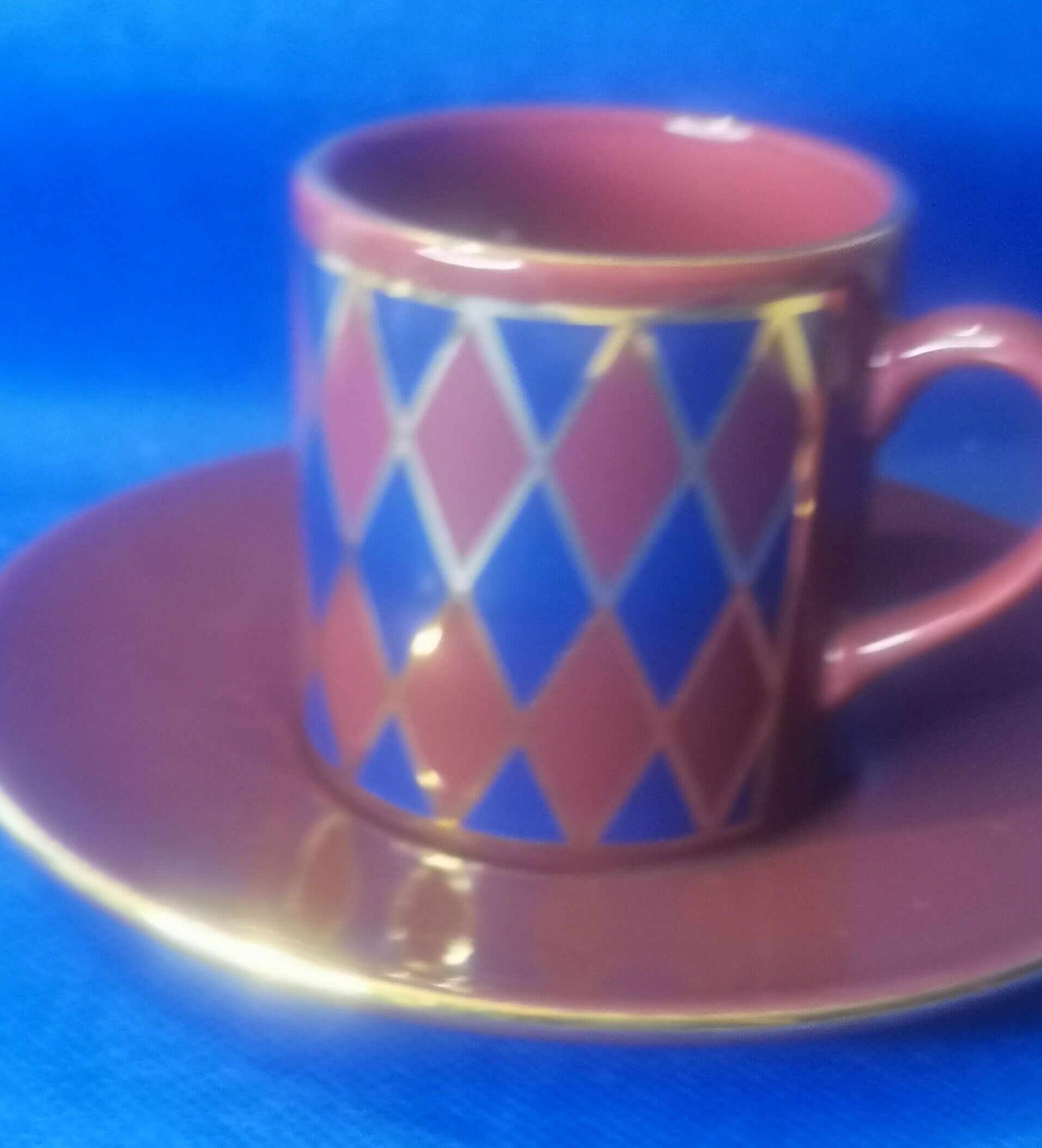 Hornsea pottery burgundy and blue harlequin demitasse cup and saucer