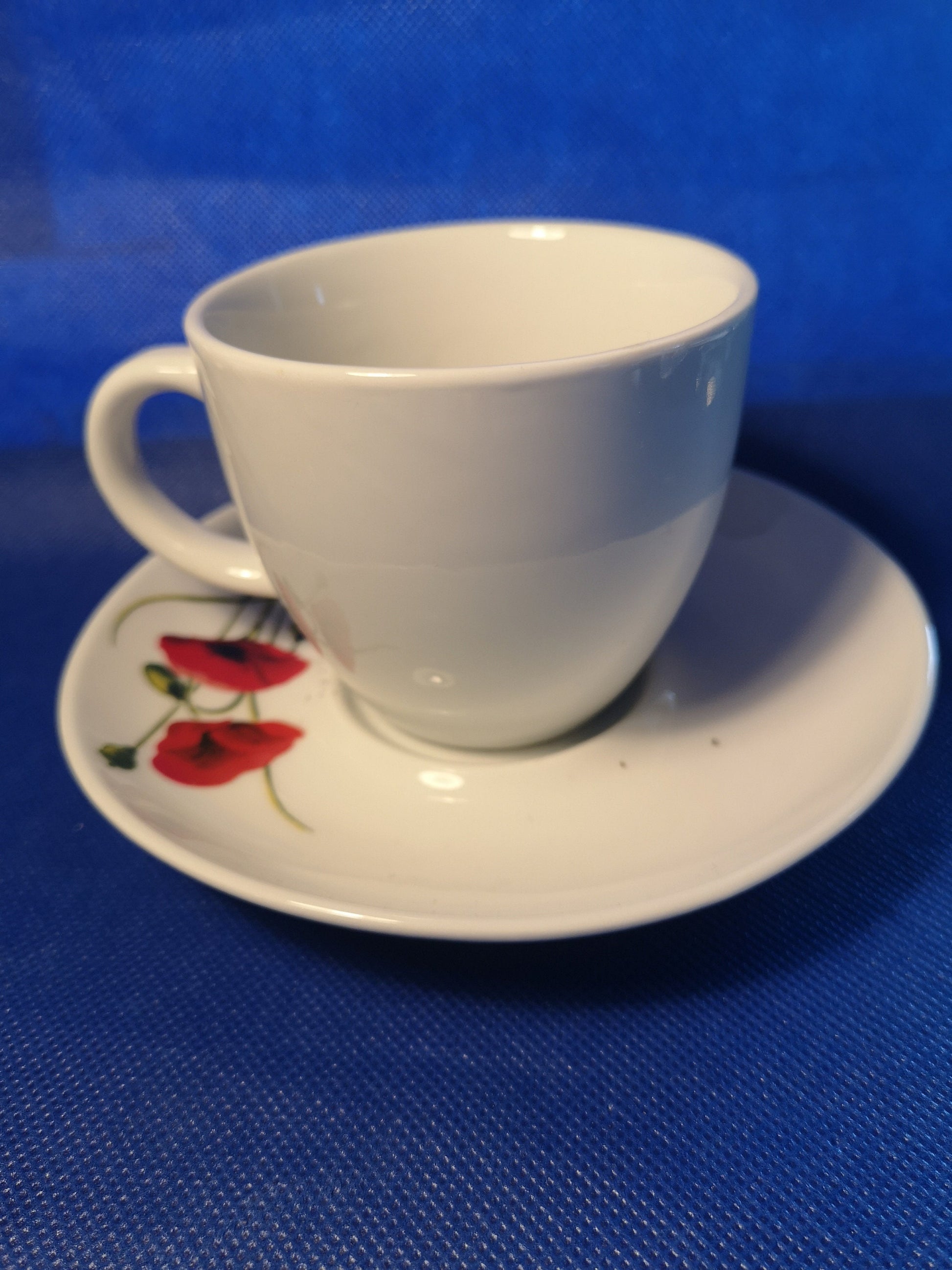 Poppy design tea cup and saucer - modern