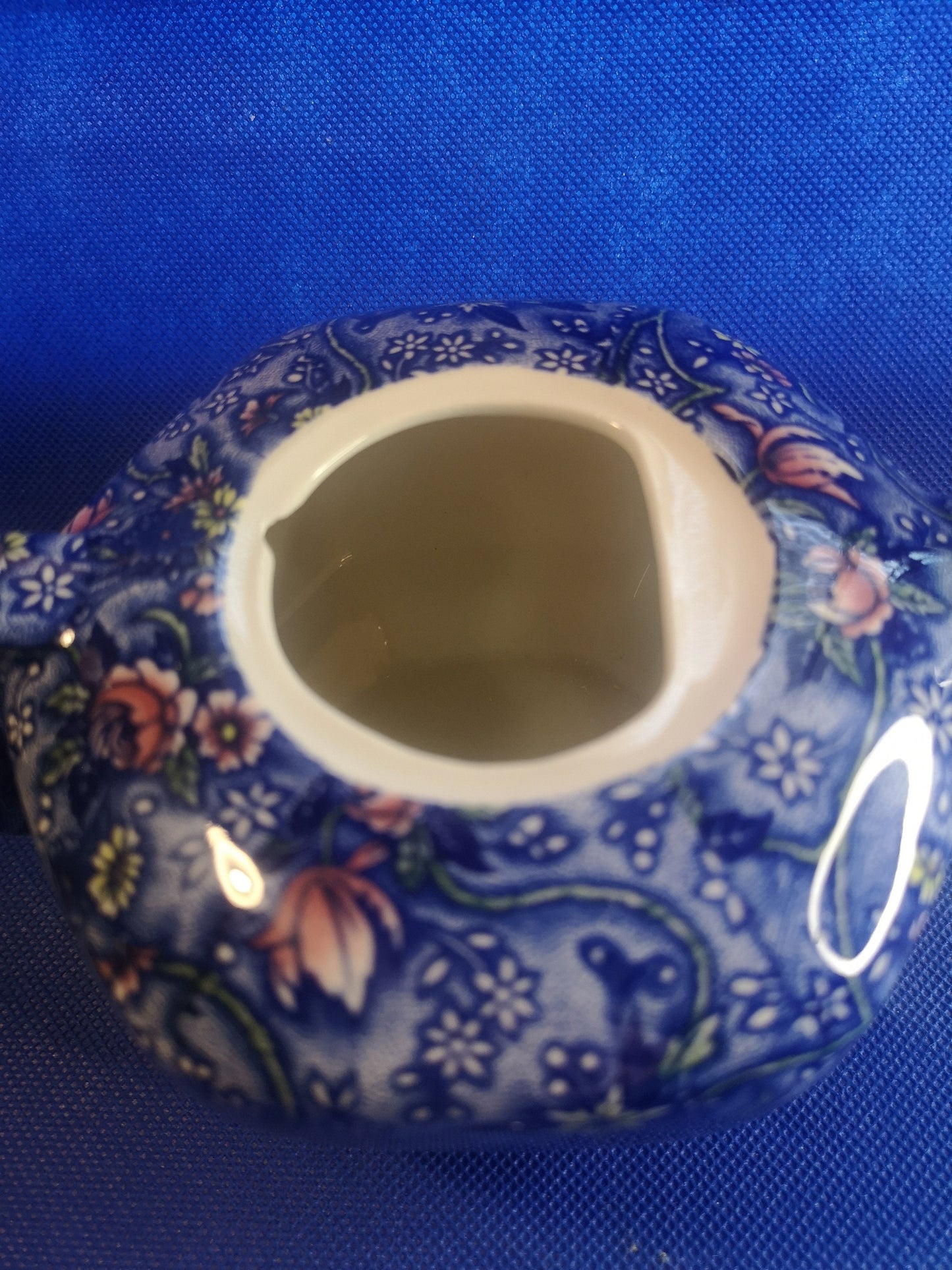 Ringtons teapot by James Sadler Blue with pink flowers