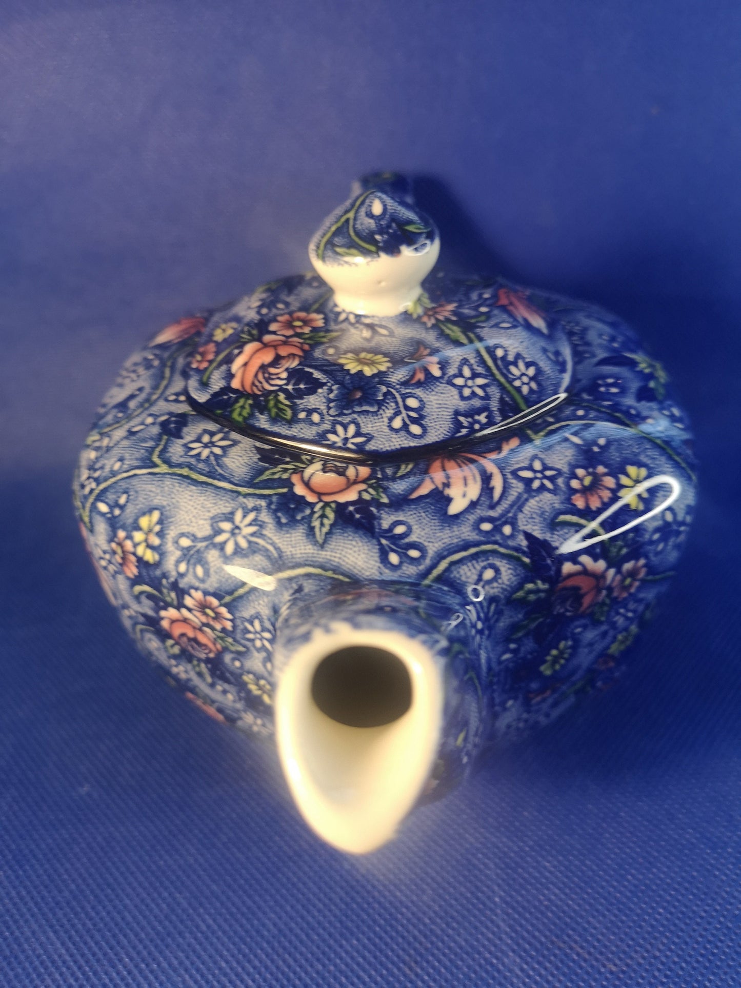 Ringtons teapot by James Sadler Blue with pink flowers