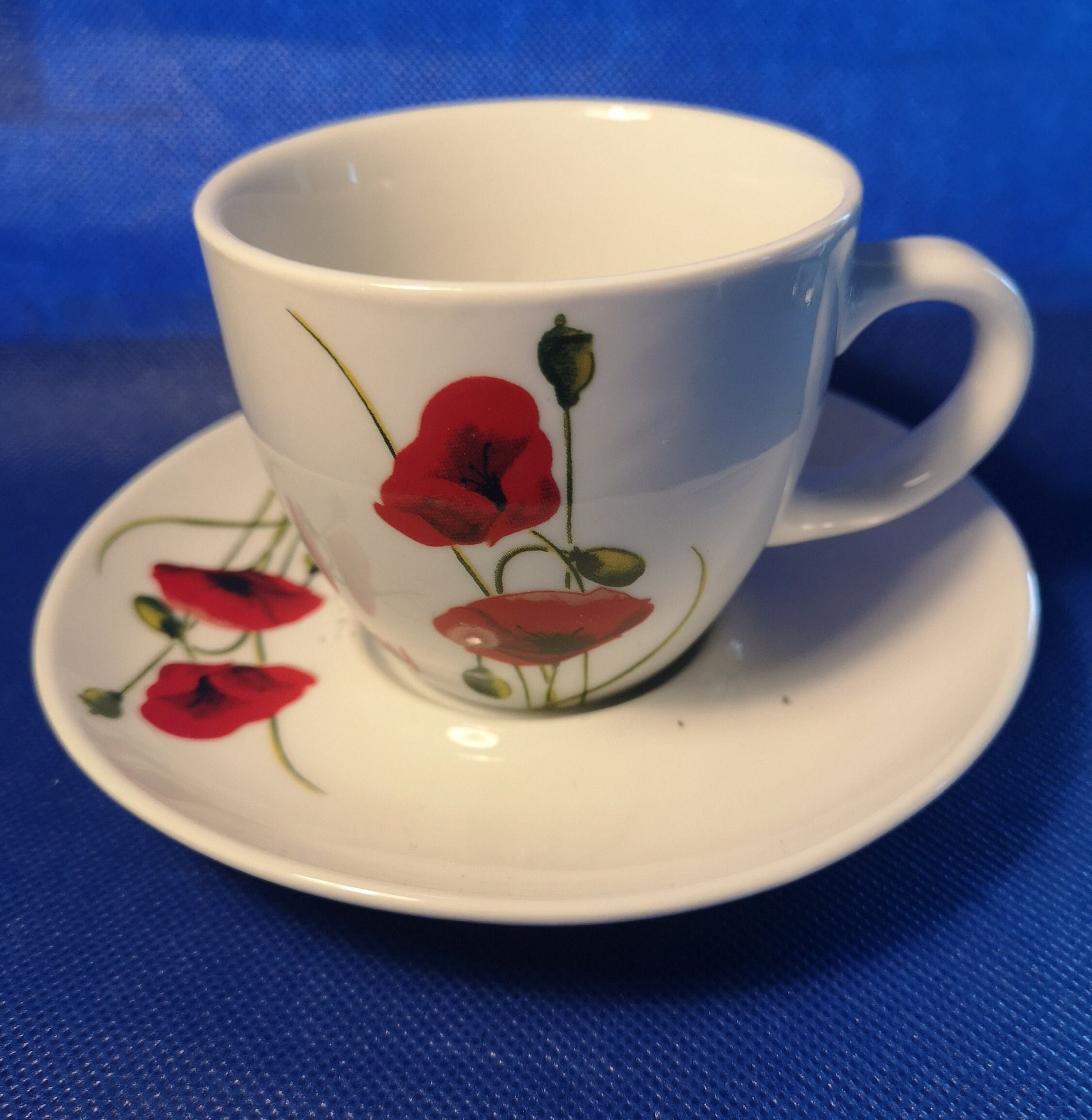 Poppy design tea cup and saucer - modern