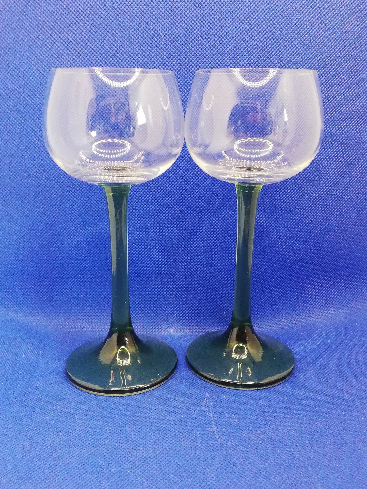 A pair of green stemmed wine glass - fantastic retro design