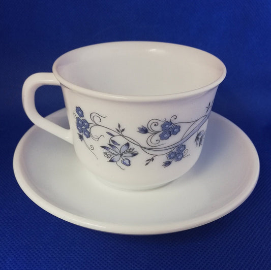 Arcopal milk white glass cup and saucer - French - lovely blue flower decoration