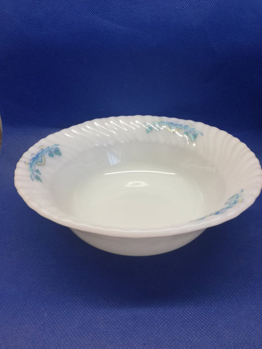 Indopal milk glass bowl with blue decoration