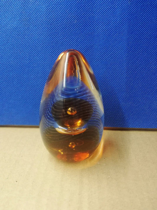 Amber and clear glass paperweight 4" high