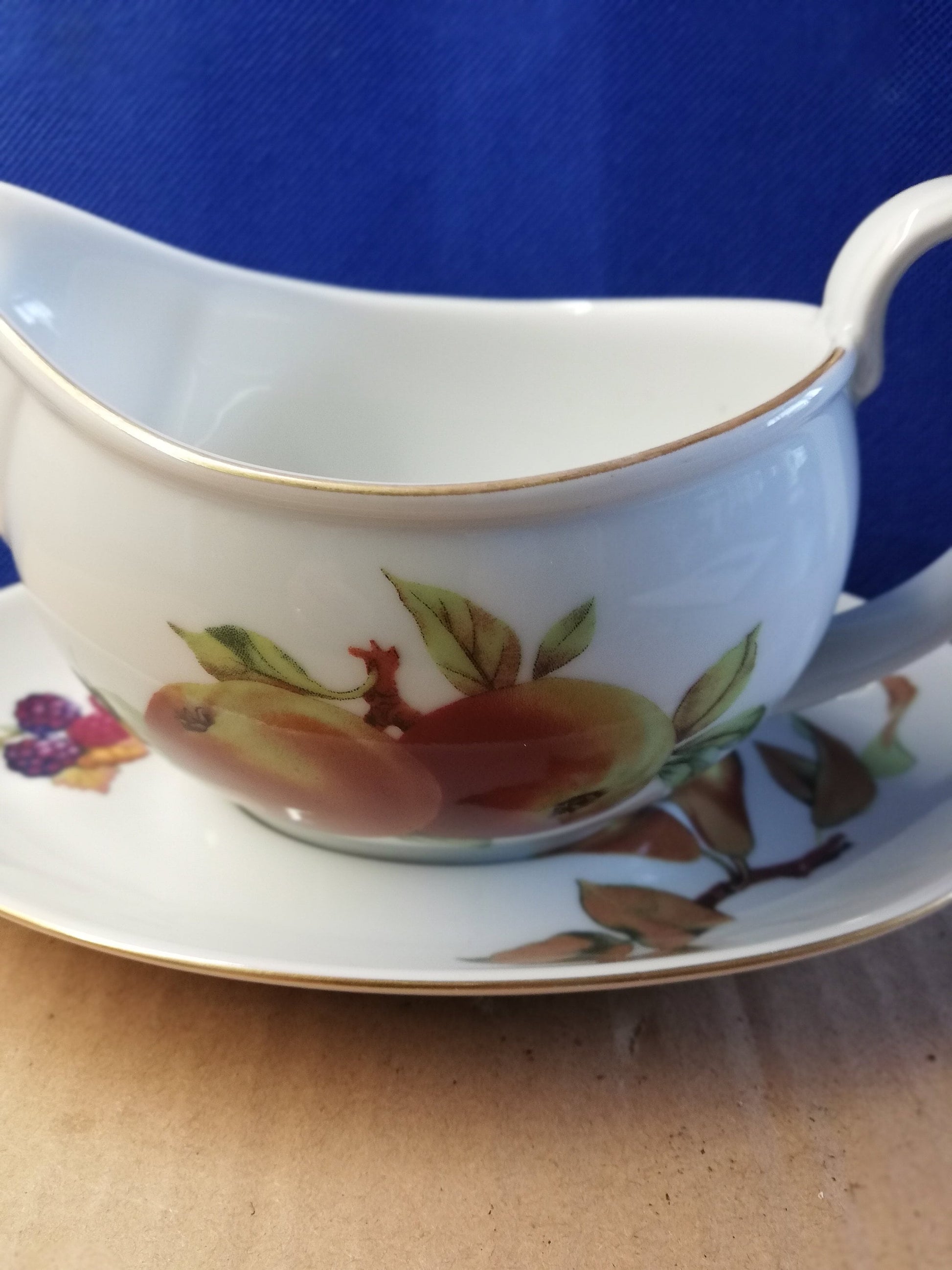 Royal Worcester Evesham gravy / sauce boat with saucer