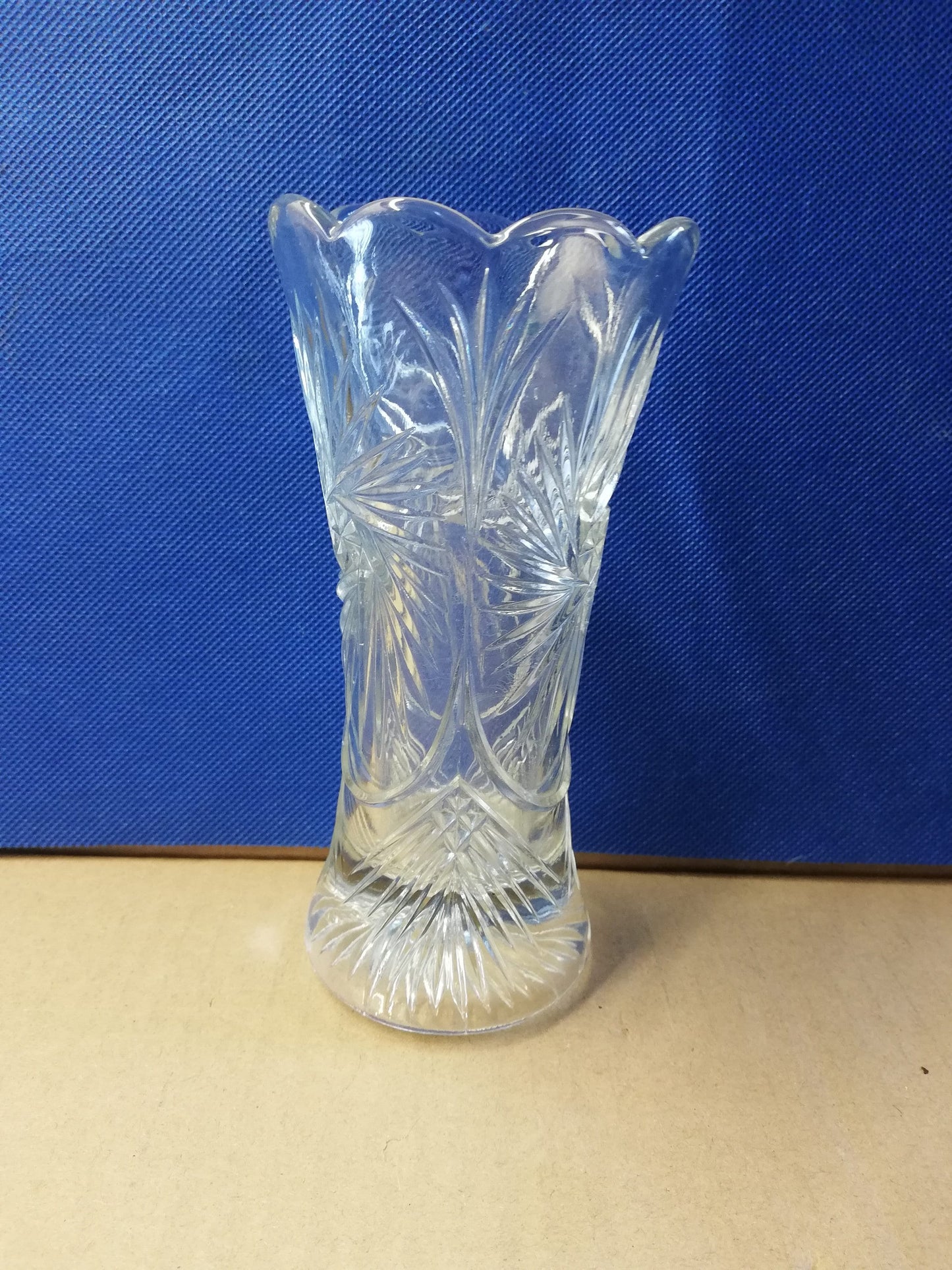 Glass vase with scalloped top 6" tall