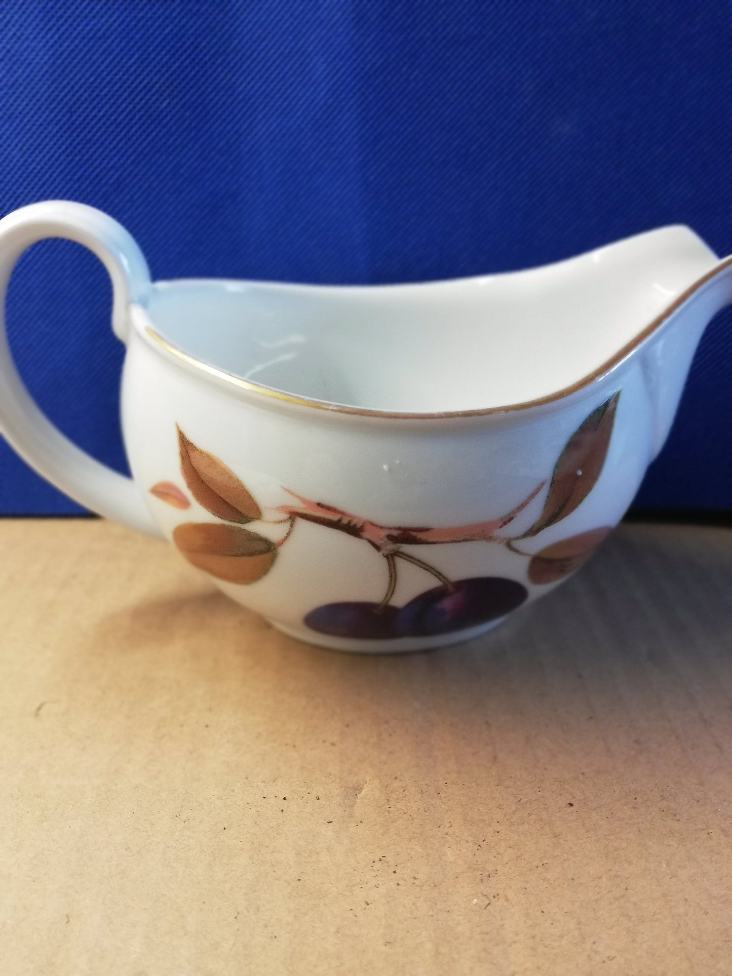 Royal Worcester Evesham gravy / sauce boat with saucer