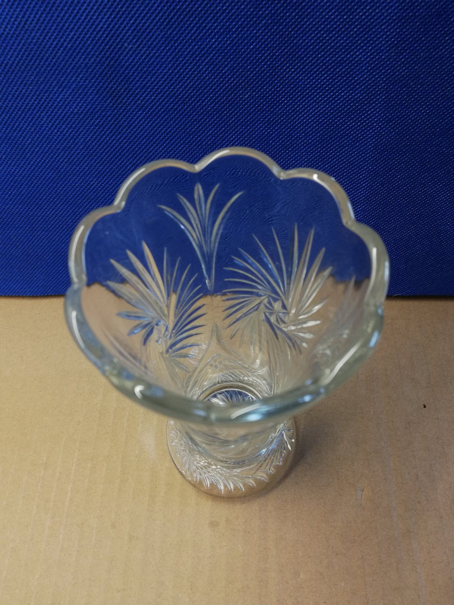 Glass vase with scalloped top 6" tall